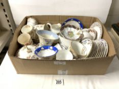 A QUANTITY OF MIXED PORCELAIN TEA CUPS AND SAUCERS, AND A SUGAR BOWL.