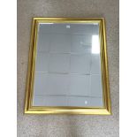 MODERN BEVELLED WALL MIRROR IN GILT FRAME, 92X118 CMS.