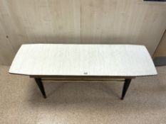 A 1960s RECTANGULAR MELAMINE TOP COFFEE TABLE WITH BRASS FITTINGS, 120X40 CMS.
