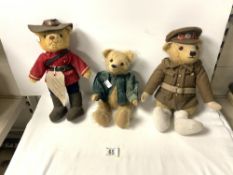 A CANADIAN MOUNTIE BEAR 2003, VINTAGE TEDDY BEAR WITH ARMY UNIFORM AND ANOTHER BEAR.