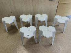 SET OF SIX 1980s HEXAGONAL WHITE PLASTIC STACKING TABLES.