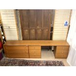 A MID-CENTURY HEALS MADE BY ALFRED COX TEAK 9 DRAWER UNIT WITH STEEL HANDLES, 254X46X67 CMS.