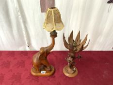 CARVED WOODEN CROCUS TABLE LAMP, AND CARVED WOODEN ELEPHANT TABLE LAMP.