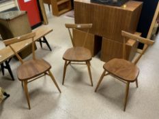 THREE ERCOL STACKING CHAIRS.