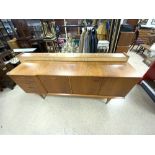 A MID-CENTURY TEAK SIDEBOARD WITH A DRINKS SECTION AND FOUR DRAWERS, 184X38X78 CM.