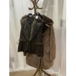 A MARKS AND SPENCER BROWN FUR-LINED SHEEPSKIN GILET SIZE 14 WITH AN ANTARTEX FUR-LINED BROWN