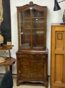 A MAHOGANY AND BURR WALNUT GLAZED DISPLAY CABINET, WITH SINGLE DRAWER AND CUPBOARD, 70X38X182 CMS.