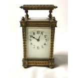 ORNATE BRASS CARRIAGE CLOCK; 15CM