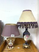 TWO FRENCH PORCELAIN TABLE LAMPS DECORATED WITH FLOWERS AND BIRDS. 1 A/F.