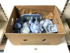 QUANTITY OF WEDGWOOD BLUE AND WHITE JASPER WARE - INCLUDES CANDLESTICK; 13 CMS, TEAPOT, SUGAR BOWL