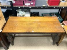 A 17TH-CENTURY STYLE CARVED OAK REFRECTORY TABLE ON CARVED BULBOUS LEGS AND FRIEZE, 150X76X66 CMS.