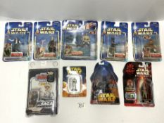 EIGHT STAR WARS ACTION FIGURE SETS IN BOXES.