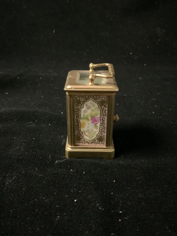 MINIATURE FRENCH CLOCK WITH HAND PAINTED ENAMEL IN BRASS CASING; 8CM - Image 3 of 5