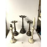 PAIR OF PAINTED BRASS CANDLESTICKS; 34 CMS AND 3 EASTERN BRONZE OIL LAMPS.