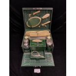 A 1938 TOILET/GROOMING BOX EXTENSIVELY FITTED WITH 4 SILVER TOP BOTTLES - BIRMINGHAM 1938, AND