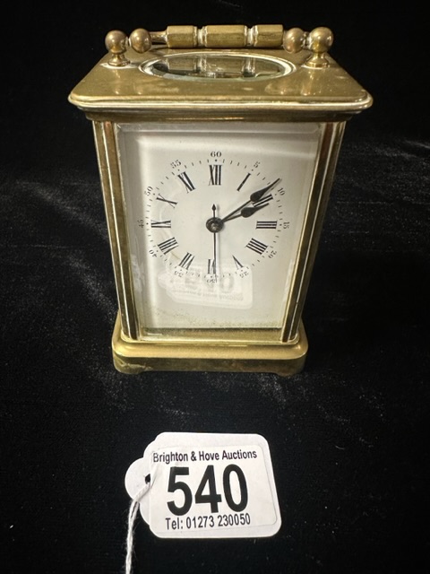 A FRENCH BRASS CARRIAGE CLOCK.