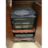 A PANASONIC STACKING AUDIO SYSTEM, A MATSUI 3 DISC COMPACT DISC PLAYER; IN A MAHOGANY CABINET.