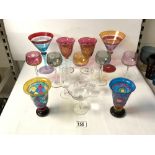 TWO CRANBERRY AND GILT WINE GLASSES, 4 MULTI COLOURED HAND DECORATED COCKTAIL AND WINE GLASSES AND