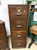 AN EARLY 20TH-CENTURY WOODEN FOUR-DRAWER FILING CABINET 135 X 47 X 74CM