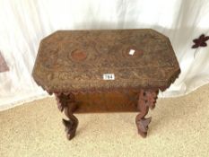 A SMALL HEAVILY CARVED BURMESE TWO TIER TABLE, 50X50 CMS.