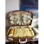 A 1950S PICNIC SET IN FITTED CASE, BY BREXTON.