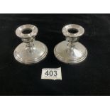 PAIR STERLING SILVER ENGRAVED CIRCULAR SQUAT CANDLESTICKS BY BIRKS OF USA; 6.5CM
