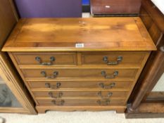 A YEWOOD REPRODUCTION SLIM 6 DRAWER CHEST OF DRAWERS, 75X25X77 CMS.