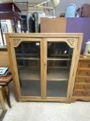 A 1940s GLAZED OAK DWARF BOOKCASE, 90X107 CMS.