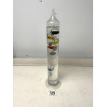 A GLASS GALILEO THERMOMETER, 34 CMS.