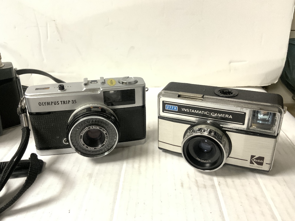 OLYMPUS OM10 CAMERA IN CASE, VINTAGE KODAK CAMERA, SONY DSC - T30 CYBER SHOT CAMERA AND OTHERS. - Image 3 of 5