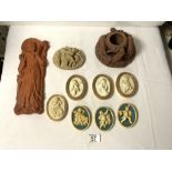 SEVEN OVAL MINIATURE PLAQUES OF CHERUBS, ANOTHER OF PUTTI AND TWO RED POTTERY PIECES.