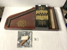 A VINTAGE ZITHER WITH GOLD LEAF DECORATION.
