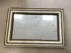 ANTIQUE MIRROR PLATE IN A CREAM AND GILT PAINTED FRAME; 122X82 CMS.