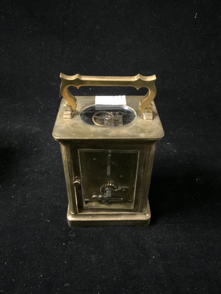 BRASS CARRIAGE CLOCK WITH WHITE ENAMEL DIAL; 11CM WITH A LEATHER OUTER CASE AND KEY - Image 4 of 5