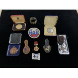 MIXED ITEMS INCLUDE A MILITARY COIN, MEDALLIONS, HALLMARKED SILVER NAPKIN RING, CLOTH BADGES AND