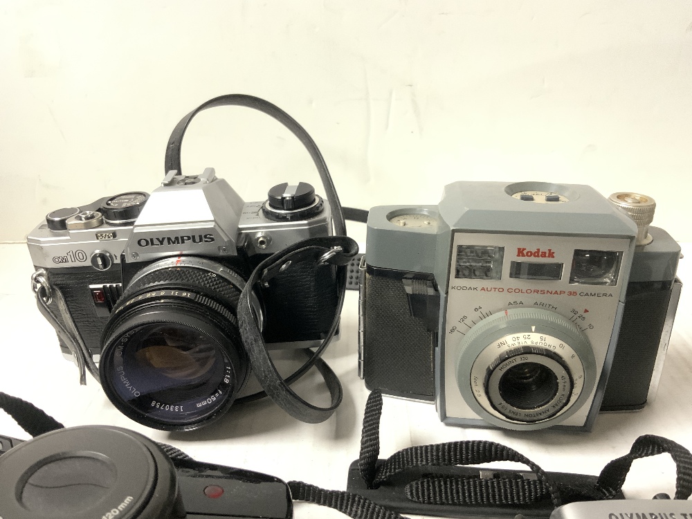 OLYMPUS OM10 CAMERA IN CASE, VINTAGE KODAK CAMERA, SONY DSC - T30 CYBER SHOT CAMERA AND OTHERS. - Image 2 of 5