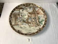 LATE 19TH-CENTURY SATSUMA POTTERY CIRCULAR WALL PLATE WITH PAINTED FIGURES IN LANDSCAPE, 38 CM