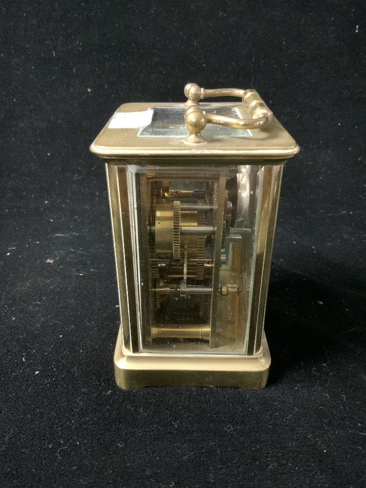 BRASS CARRIAGE CLOCK WITH STRIKING ALARM MOVEMENT WITH WHITE ENAMEL DIAL ,11CM ( REAR DOOR LOOSE ) - Image 3 of 6