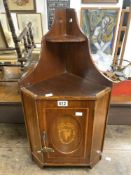 SMALL EDWARDIAN MARQUETRY INLAID MAHOGANY HANGING CORNER CABINET; 40X75 CMS.