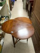 A TRIANGULAR MAHOGANY DROP LEAF OCCASIONAL TABLE; 54X72 CMS.