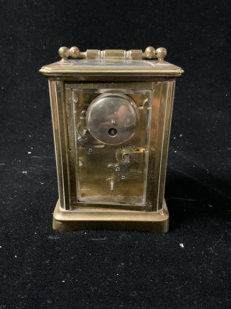 BRASS CARRIAGE CLOCK WITH STRIKING ALARM MOVEMENT WITH WHITE ENAMEL DIAL ,11CM ( REAR DOOR LOOSE ) - Image 4 of 6