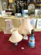 TWO PORCELAIN AND METAL MOUNTED TABLE LAMPS, AND TWO OTHER TABLE LAMPS.
