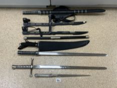A COLLECTION OF REPRODUCTION FANTASY BLADES AND SWORDS.