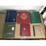 SIX STAMP ALBUMS OF GB AND WORLD STAMPS.
