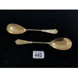 PAIR OF 800 SILVER GILT SERVING SPOONS WITH ORNATE SPIRAL TWIST AND CAST TERMINALS; 21CM; 129 GRAMS