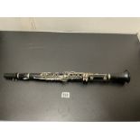 AN EBONISED CLARINET.