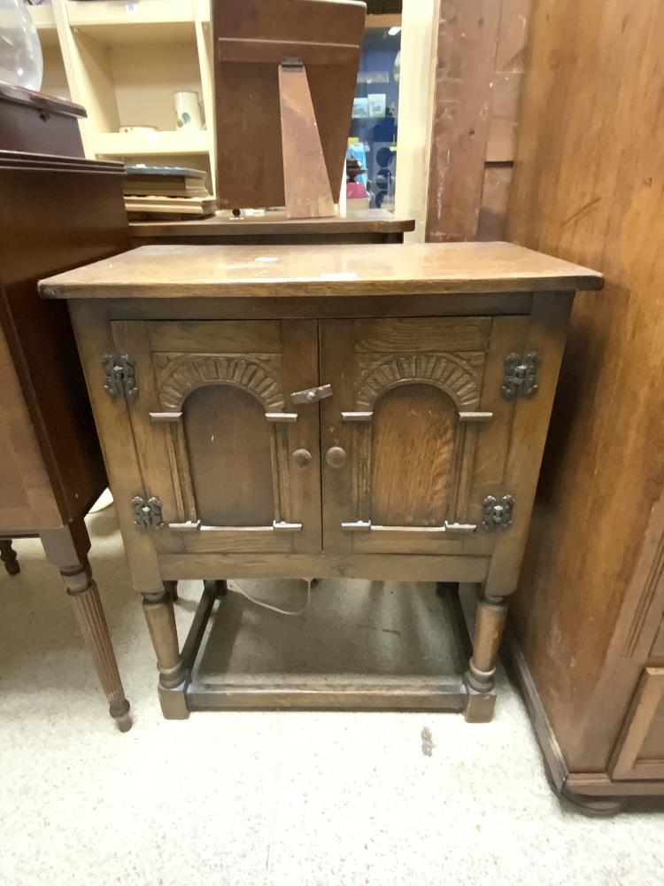 A SMALL OAK TWO DOOR CUPBOARD; 60X34X74 CMS. - Image 2 of 3