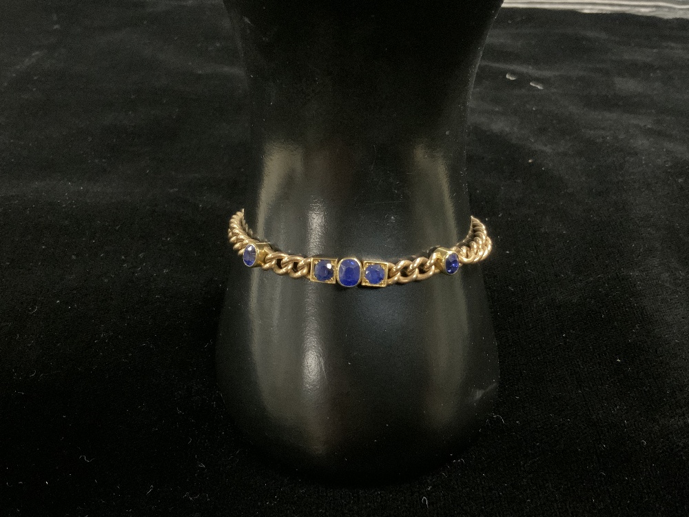 HIGH GRADE YELLOW METAL BRACELET WITH BLUE SAPPHIRES; UNMARKED; 17.5 GRAMS