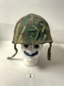 US ARMY CAMOUFLAGE HELMET.