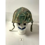 US ARMY CAMOUFLAGE HELMET.